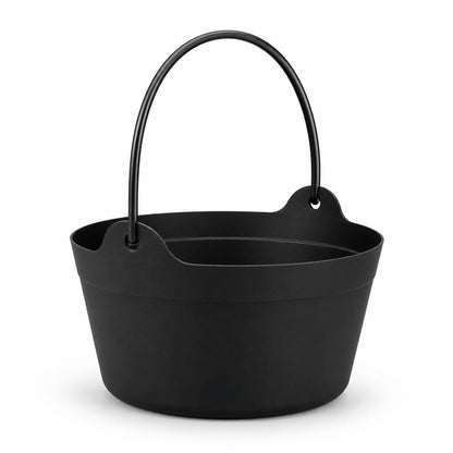 Side view of a black cauldron showing the product tag.