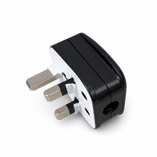 MCE 13A UK plug on wooden surface