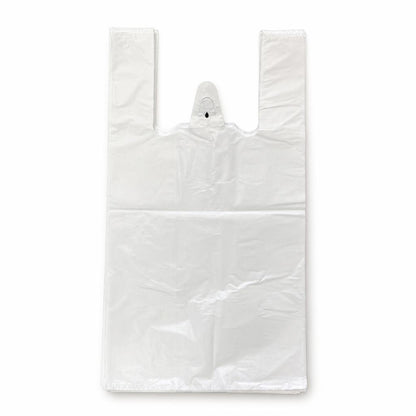 White plastic carrier bag next to a ruler measuring 30cm x 45cm