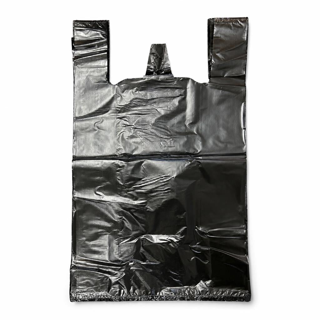 Black bin bag with handles and ruler for scale