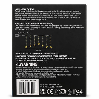 Back view of Festive Magic LED Timer Curtain Lights packaging with instructions and safety information